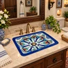 Rectangular talavera bathroom sink blue floral design installed in traditional house bathroom with wood vanity