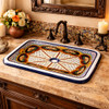 Rectangular talavera bathroom sink geometric starburst pattern in Spanish Revival bathroom