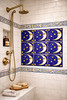 Talavera crescent moon tile used on bathroom shower wall with crisp design and smooth ceramic finish