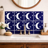 Talavera crescent moon star tile behind bathroom vanity adding handcrafted character and deep blue tone