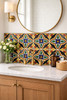 Talavera four petal medallion tile featured behind a bathroom vanity creating a traditional focal surface