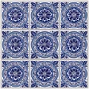 Blue medallion talavera tile pattern with white background shown in a three by three tile set with visible light cement joints