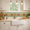 Mexican talavera arabesque floral relief border Tile above bathroom vanity mirror detail