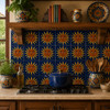 Mexican relief tile with a sun face motif featured in rustic kitchen backsplash with wood cabinets