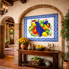 Colorful talavera fruit Mexican tile mural design in Spanish Revival interior with arches