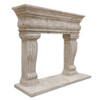 Carved stone fireplace mantel with classical columns viewed from the angle