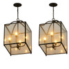 Two Spanish Colonial hanging lanterns for entry with lights on