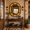 Octagonal tin mirror with yellow talavera longhorn tiles decorating luxury ranch entryway