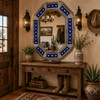 Decorating octagonal tin mirror frame with longhorn talavera tiles in western entryway