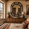 Tin talavera octagonal decorative hacienda mirror frame decorating Southwestern bedroom wall space