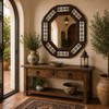 Octagonal decorative tin mirror frame with talavera tile pattern in Mediterranean entryway