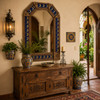 Handcrafted Tin Mirror with Moon and Stars Talavera Tile Frame in Mexican entryway