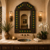 Handcrafted Tin Mirror with Green Sun Talavera Tile Frame in a warm luxury vanity space