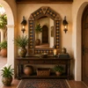 Handcrafted Tin Mirror with Sun Talavera Tile Frame decorating a Mediterranean entryway