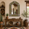 Handcrafted arch floral talavera tile tin mirror frame in Southwestern interior