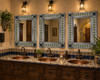 Blue Yellow Talavera Tile Mirror Metal Frame trio above hammered copper sinks in rustic restaurant bathroom with tile countertop