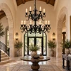 Spanish style wrought iron chandelier displayed in a grand traditional hacienda entryway