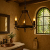 Iron chandelier in bathroom