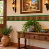 Mexican talavera tile green border creating a colorful decorative wall with floral accents