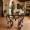 Wrought iron table stand for round square tabletop in a Spanish-style home with artisan decor