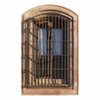 Arched wrought iron window guard with vertical bars installed on a house with cantera stone decorative architectural alements around the window