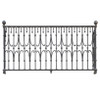 Wrought iron balcony railing with vertical scroll and drop motif