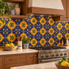 Mexican talavera tile yellow medallion in a colorful kitchen backsplash with rustic wood cabinetry.