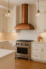 30 inch minimalist copper range hood with round chimney in transitional kitchen, hammered copper canopy above balanced cabinetry and refined stone surfaces