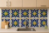 Talavera tile yellow flower cobalt design 4x4-inch used on a bright kitchen backsplash with artisanal character