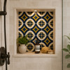 Blue yellow diamond talavera tile featured inside an arched bathroom niche with natural lighting