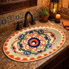 Mexican talavera lattice scrollwork bathroom sink displayed in a restaurant restroom with traditional decor