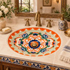 Mexican talavera lattice scrollwork bathroom sink in a vintage brass bathroom with artisan tile
