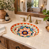Mexican talavera lattice scrollwork bathroom sink in a modern hacienda bath with natural textures