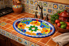 Multicolor floral talavera bathroom sink styled in a Mexican kitchen as a decorative handcrafted focal point