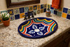 Geometric talavera mexican bathroom sink styled in a house bathroom as a colorful handcrafted focal piece