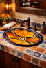 Talavera bathroom sink shell motif featured in a restaurant washroom highlighting authentic Mexican design