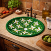 Green calla talavera mexican bathroom sink used as a decorative prep sink in a rustic kitchen space