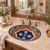 Talavera bathroom sink geometric design in a rustic luxury bathroom with brass accents