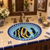Talavera bathroom sink tropical fish in a colonial powder room with brass fixtures and cream tile