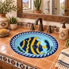 Talavera bathroom sink tropical fish in a Southwestern tile vanity with warm earth tones and brass