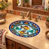 Oval talavera bathroom sink orange fish floral border in a Southwestern vanity with warm accents