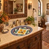 Oval talavera bathroom sink floral medallion Mexican design in hacienda powder room.