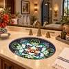 Oval talavera bathroom sink black floral medallion pattern in a boutique hotel bathroom
