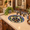 Oval talavera bathroom sink navy yellow floral medallion in rustic guest bathroom.