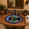 Tropical fish oval talavera bathroom sink in a Spanish Revival bath with Talavera tilework.