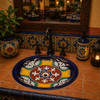 Colorful Mexican bathroom sink with handcrafted elegance in a Mexican restaurant restroom with traditional talavera accents