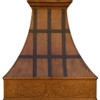 Copper range hood with dark straps shown front view, riveted bands and smooth apron on wall