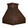 Angled view of minimalist trapezoidal copper range hood with deep apron, hammered coffee patina