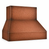 Close-up detail of wide-chimney under-cabinet copper range hood highlighting hand-hammered texture and darkened corners