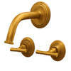Brass wall mount faucet with two rustic lever handles and warm gold finish